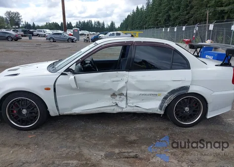 1998 Mitsubishi Lancer z USA, uszkodzony, nr VIN CP9A0003723